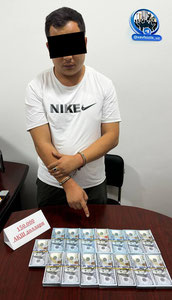 Sirdaryoda 150 ming dollar qalbaki pulni sotmoqchi bo'lgan shaxs ushlandi