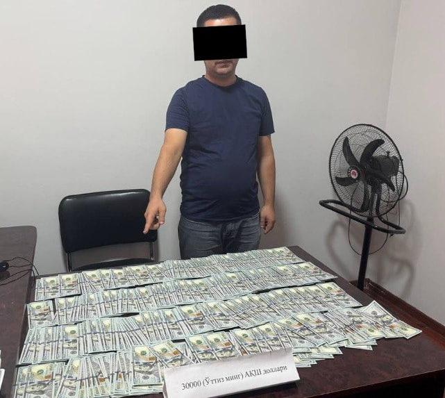 Фарғонада солиқ идораси ходими 30 минг доллар пора билан ушланди