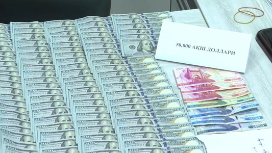 Тошкентда ички ишлар ходимига 50 минг доллар пора таклиф қилган шахс қўлга олинди
